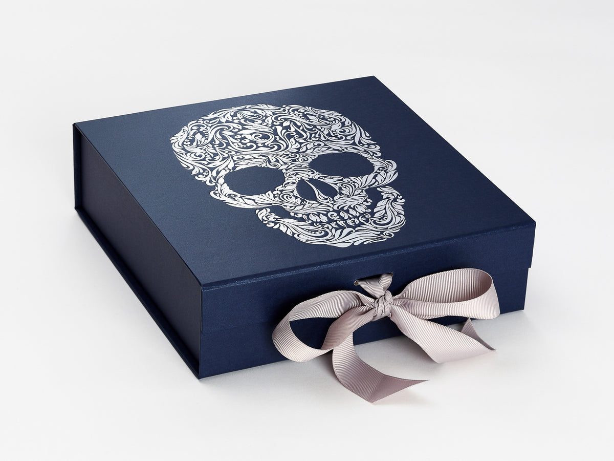 Gift box with blue ribbon and bow, toys and decor on new y…